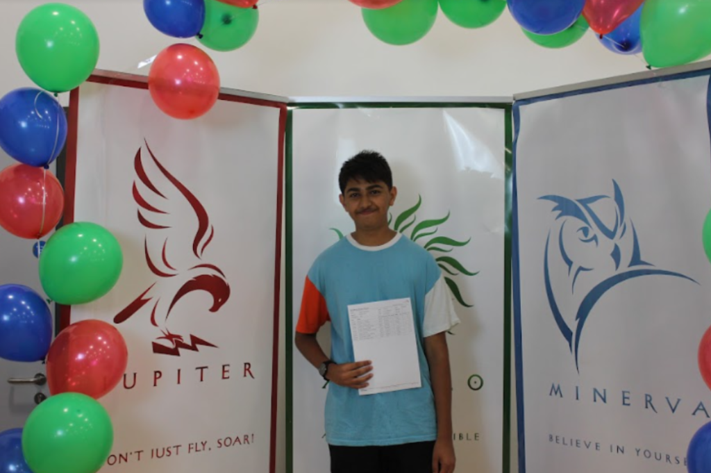 Aniket holding their results