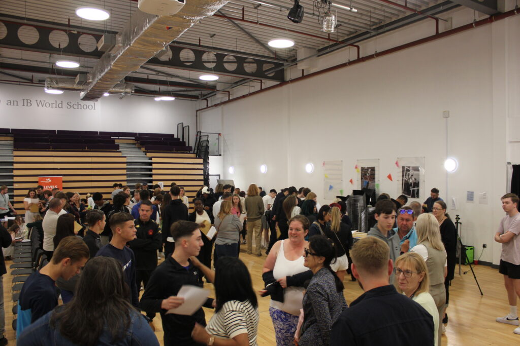 Students collecting their results in the hall