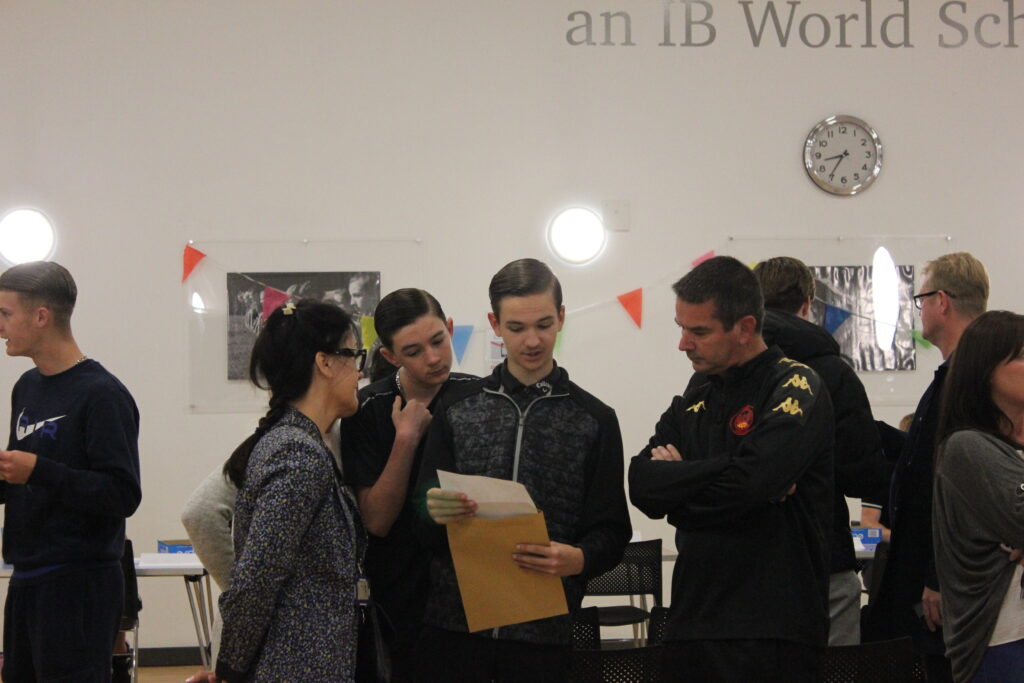 Students collecting their results in the hall