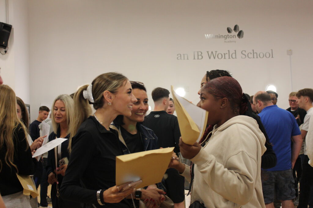 Students collecting their results in the hall